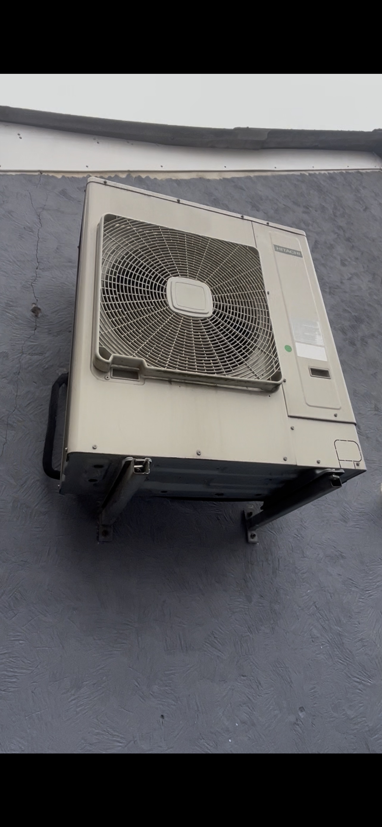 Wall-mounted air conditioning unit installed